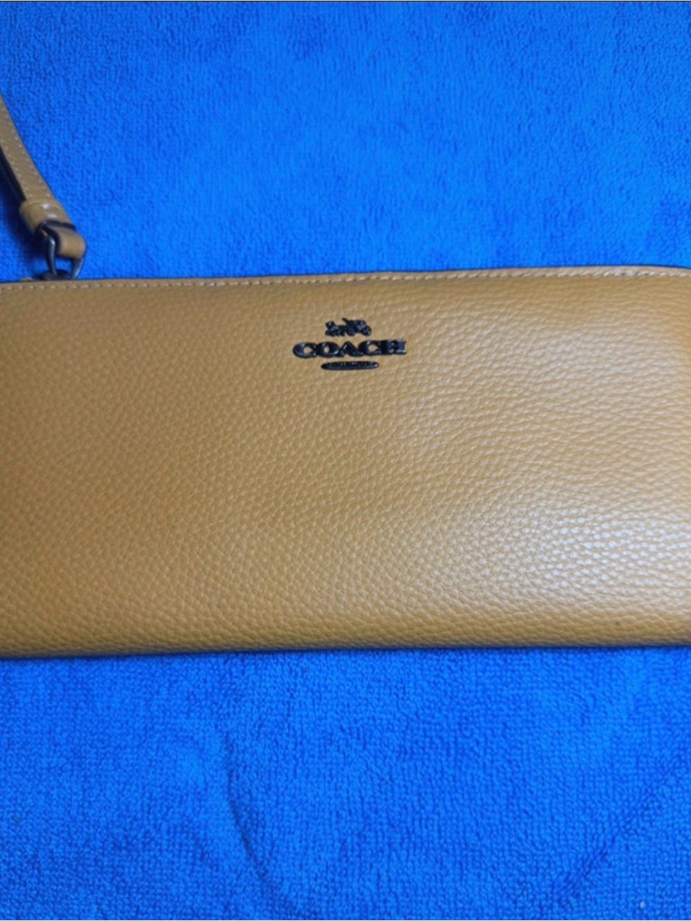 Coach Pebbled Leather Wristlet Clutch in mustard yellow
